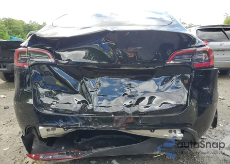 2025 Tesla Model Y из США, поврежденный, VIN 7SAYGDED3SA372244